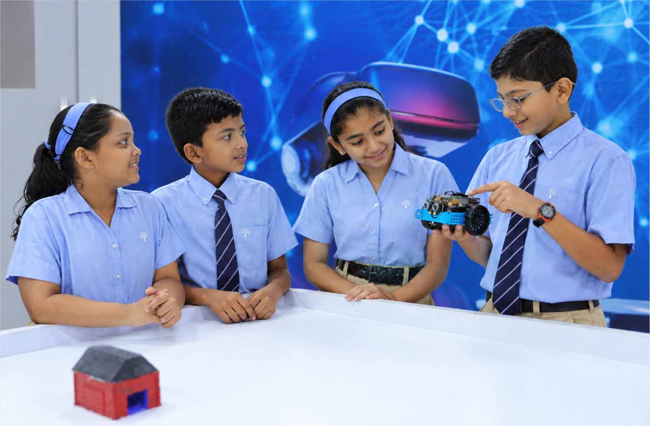 A group of school students participating in a leadership or management activity in a modern classroom.