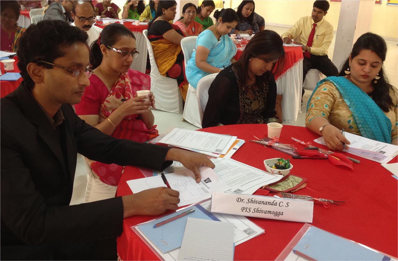 Parent writing notes in a school diary