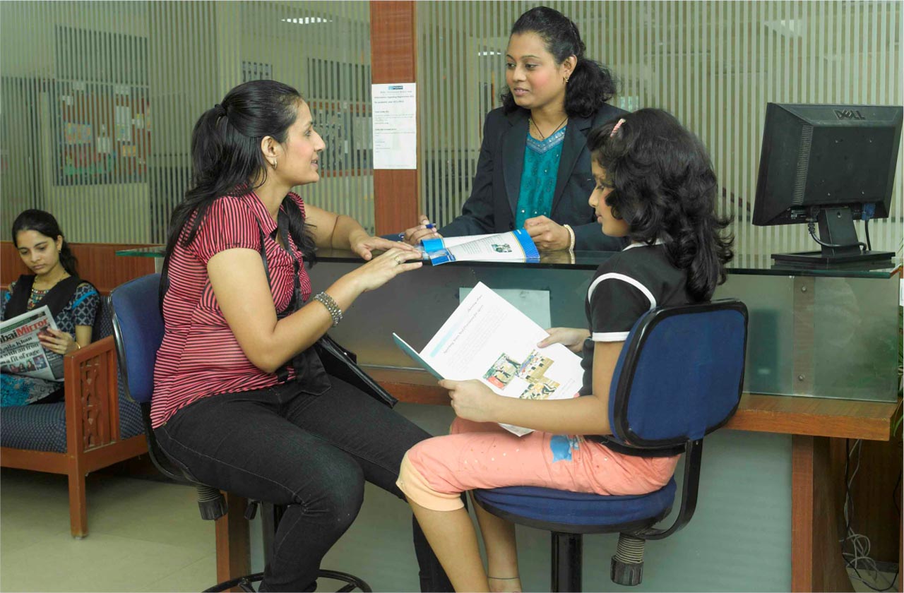 Parent and teacher having a friendly discussion