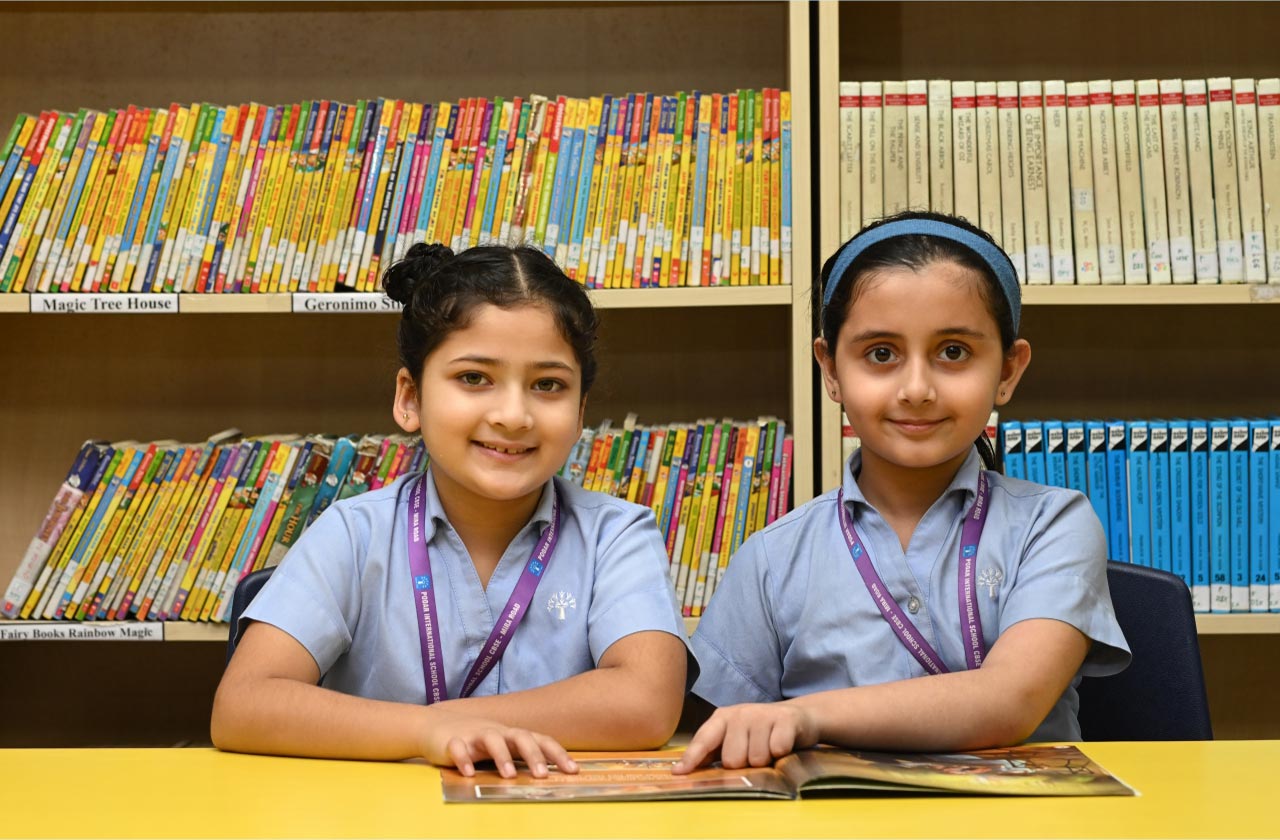 A student placing a motivational book