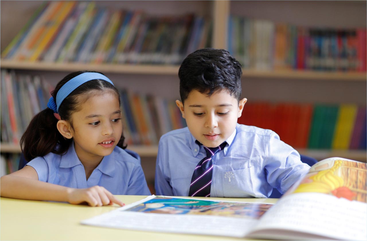 A split-screen style image a student reading at