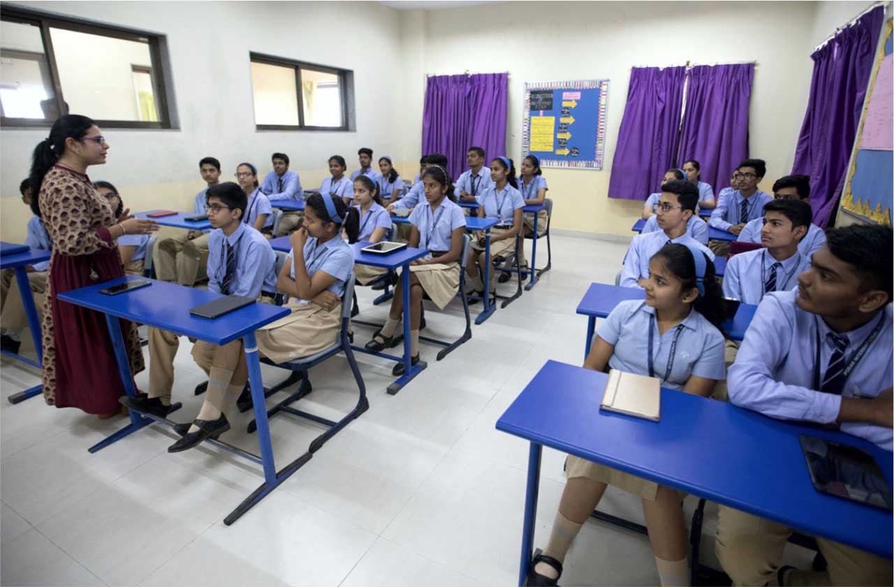 A counsellor helping young students explore their interests and future career paths.