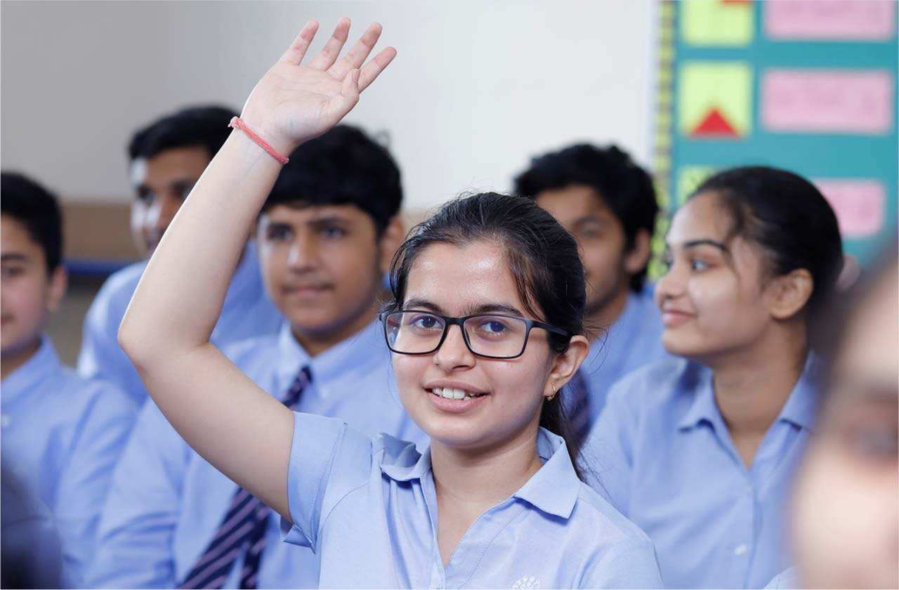 Students actively participating in a school activity, such as a group project, sports, or classroom discussion, showing teamwork and confidence.