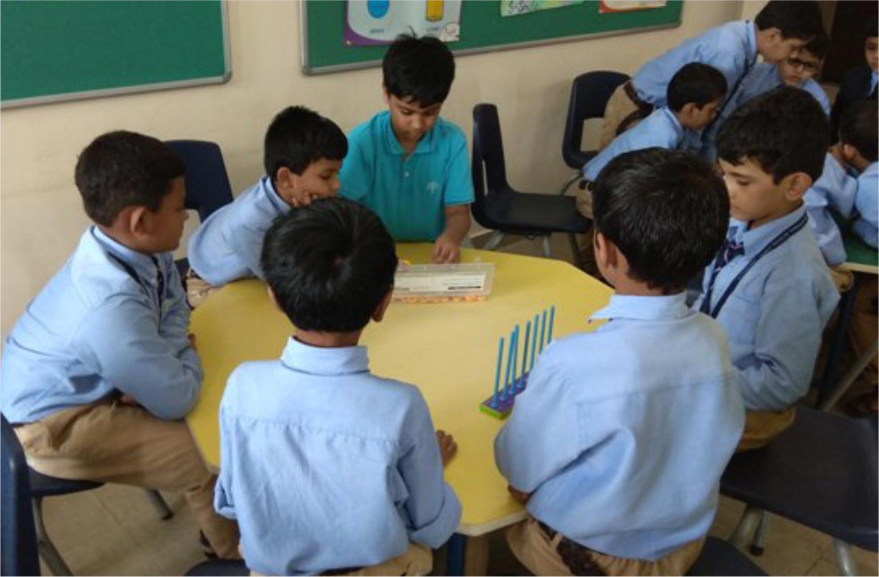 Students participating in a classroom discussion, listening to different viewpoints respectfully and sharing their ideas with confidence.